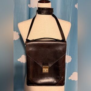 Bally leather crossbody- brass metal hardware. Leather shoulder pad for strap.